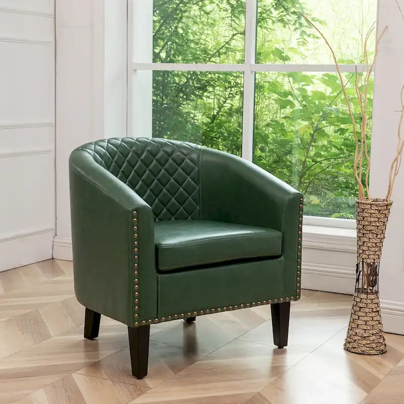Fauteuil club en similicuir capitonné, avec clous décoratifs