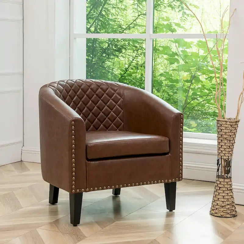 Fauteuil club en similicuir capitonné, avec clous décoratifs