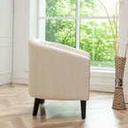 Fauteuil club en similicuir capitonné, avec clous décoratifs