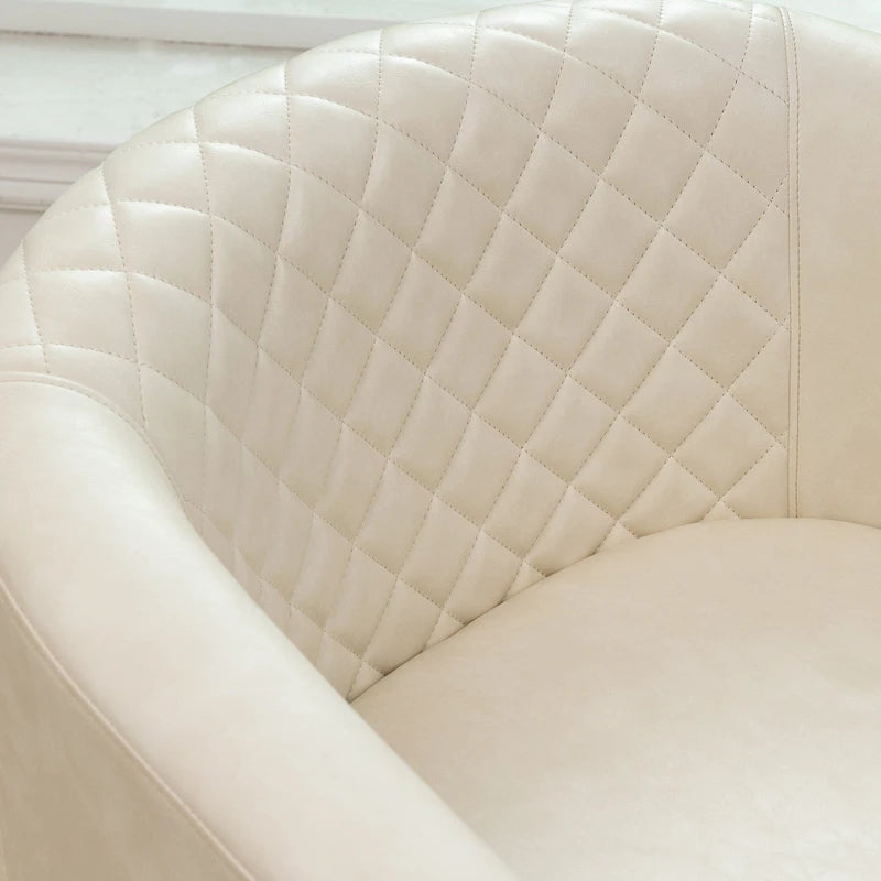 Fauteuil club en similicuir capitonné, avec clous décoratifs