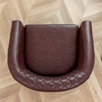 Fauteuil club en similicuir capitonné, avec clous décoratifs