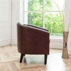 Fauteuil club en similicuir capitonné, avec clous décoratifs