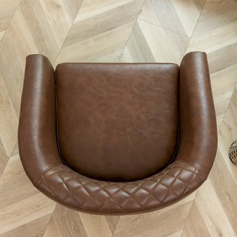 Fauteuil club en similicuir capitonné, avec clous décoratifs