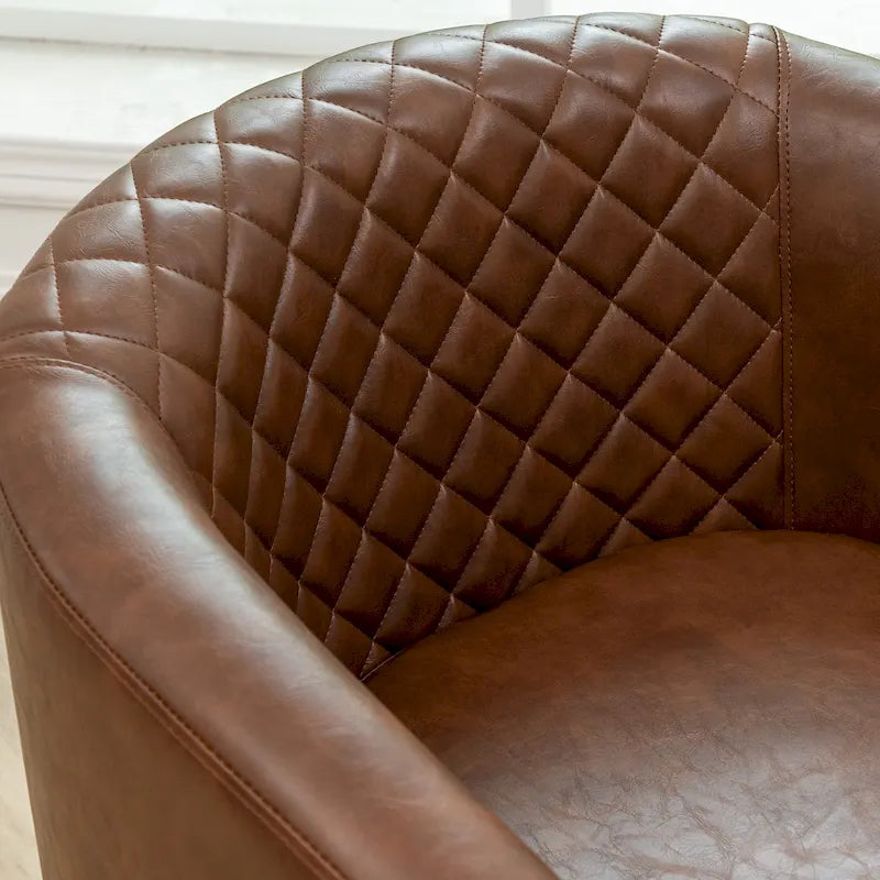 Fauteuil club en similicuir capitonné, avec clous décoratifs