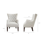 Fauteuil à dossier haut à chevrons et capitonnage.
