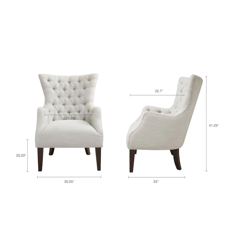 Fauteuil à dossier haut à chevrons et capitonnage.