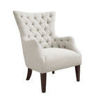 Fauteuil à dossier haut à chevrons et capitonnage.