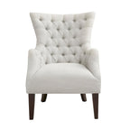 Fauteuil à dossier haut à chevrons et capitonnage.