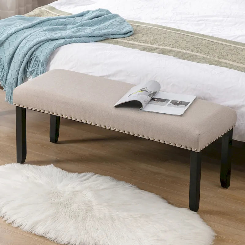 Banc rembourré moderne de 112 cm avec pieds en bois et clous décoratifs