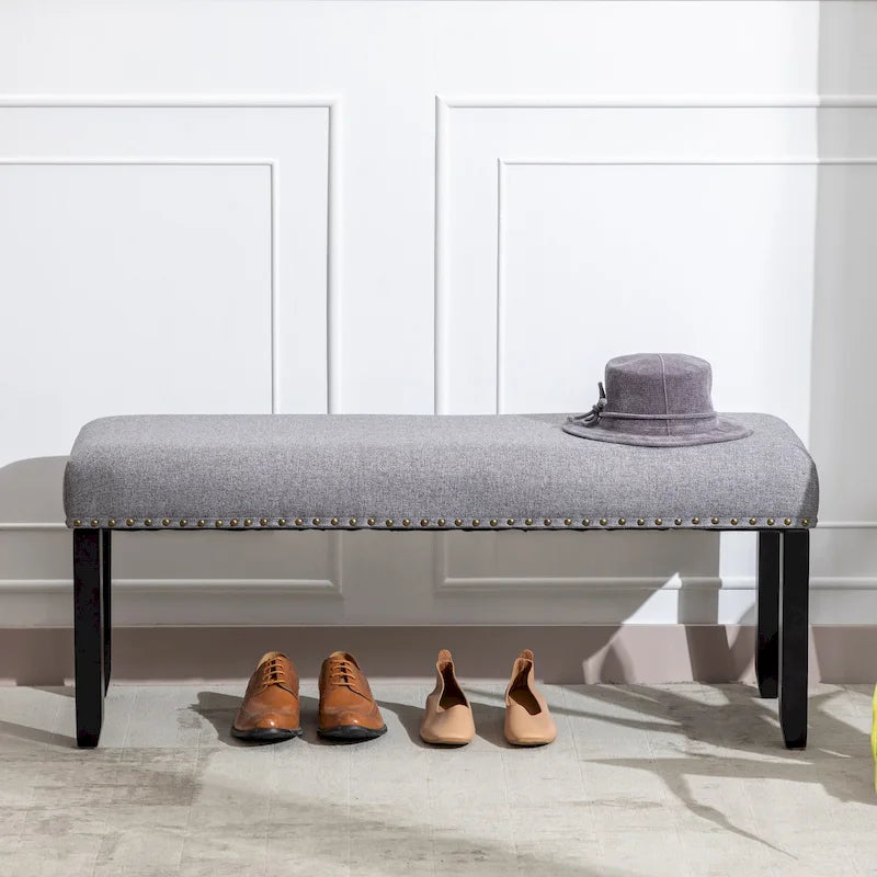 Banc rembourré moderne de 112 cm avec pieds en bois et clous décoratifs