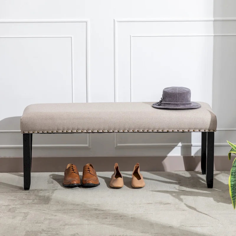 Banc rembourré moderne de 112 cm avec pieds en bois et clous décoratifs