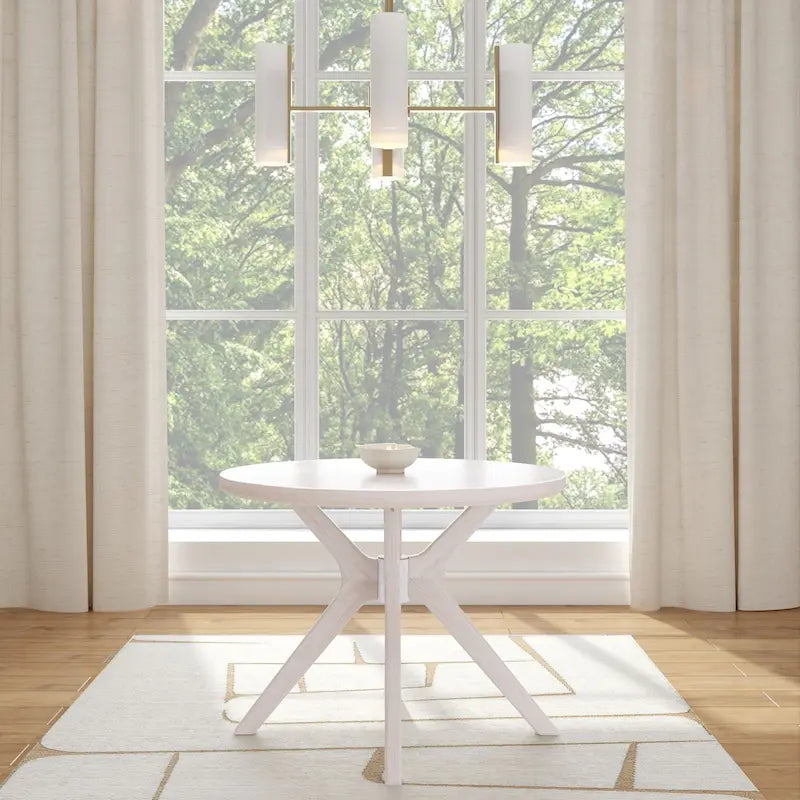 Table à manger ronde à pieds croisés de 38 pouces